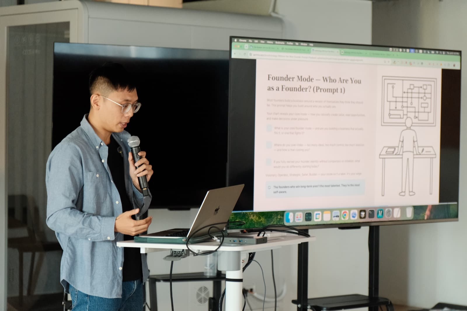 Tony teaching beside a screen during a Modern Shrine calibration workshop.